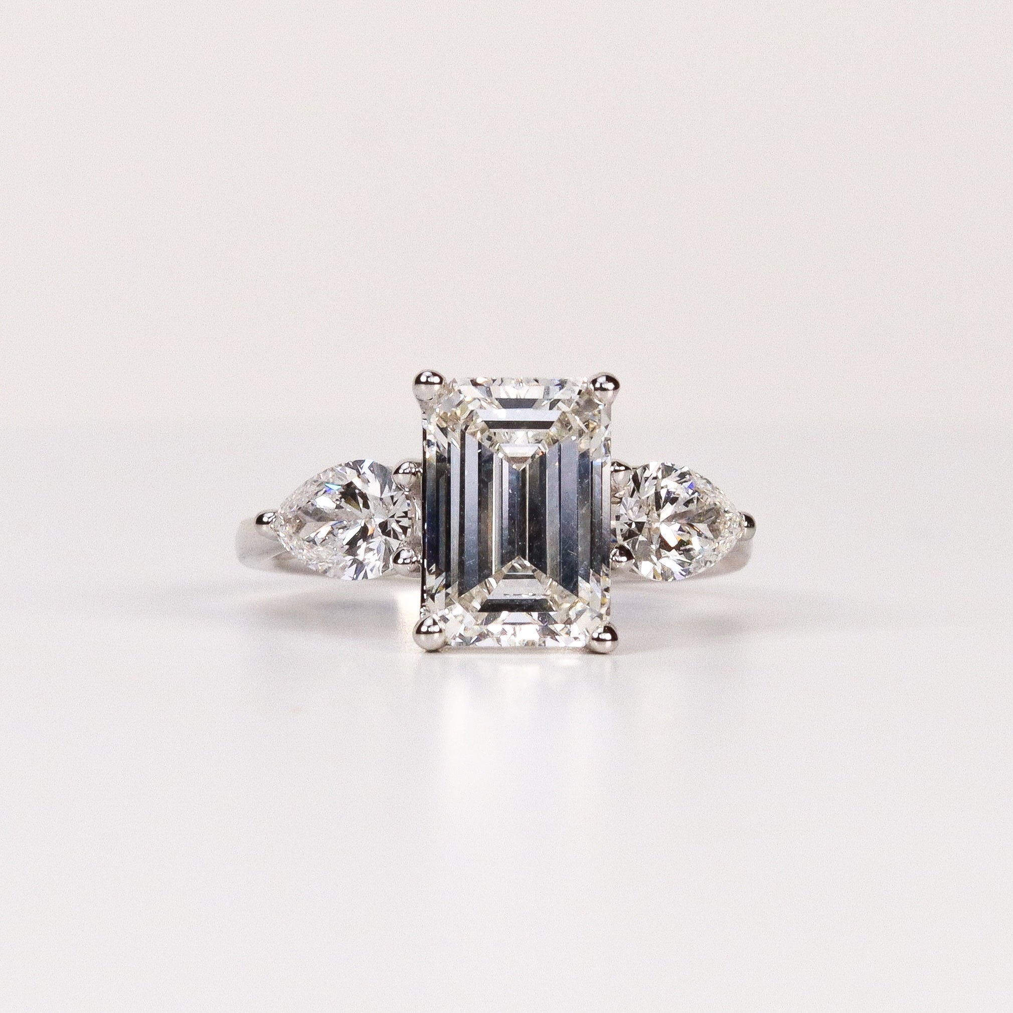 LAB-GROWN DIAMOND EMERALD-CUT & PEAR SIDE-STONE THREE-STONE ENGAGEMENT RING image 0