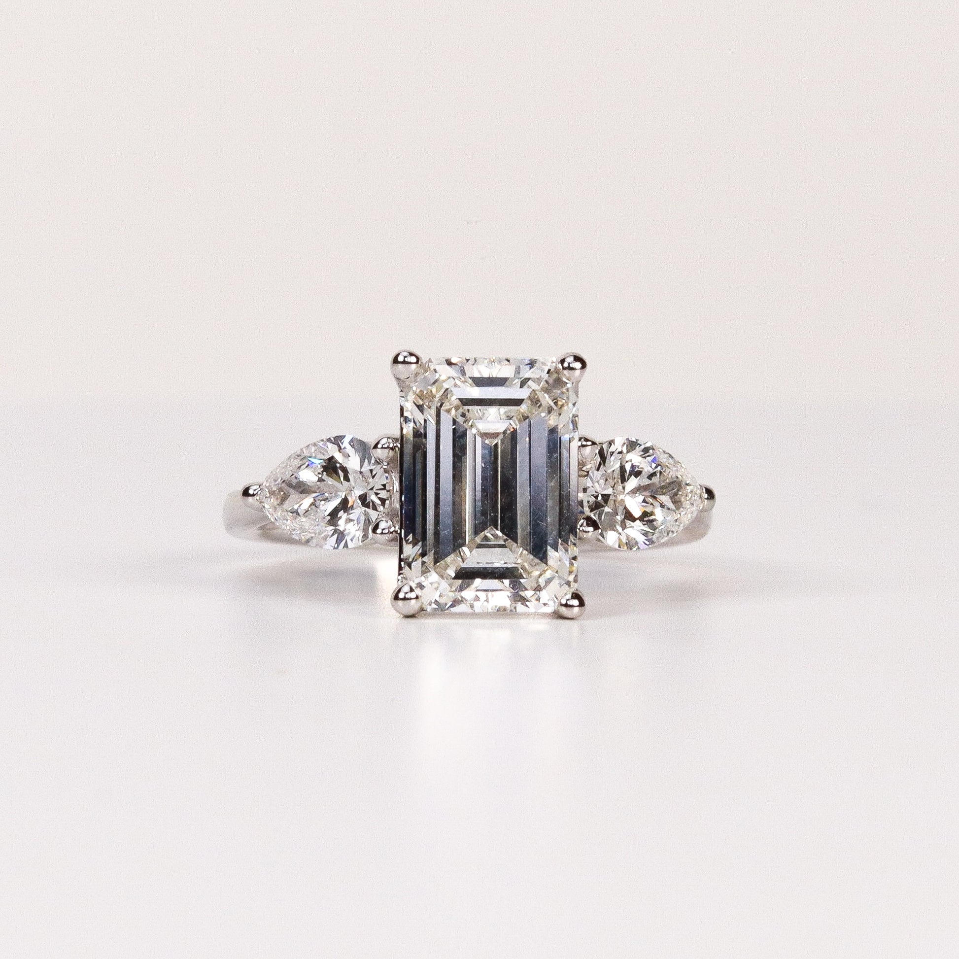 LAB-GROWN DIAMOND EMERALD-CUT & PEAR SIDE-STONE THREE-STONE ENGAGEMENT RING image 0