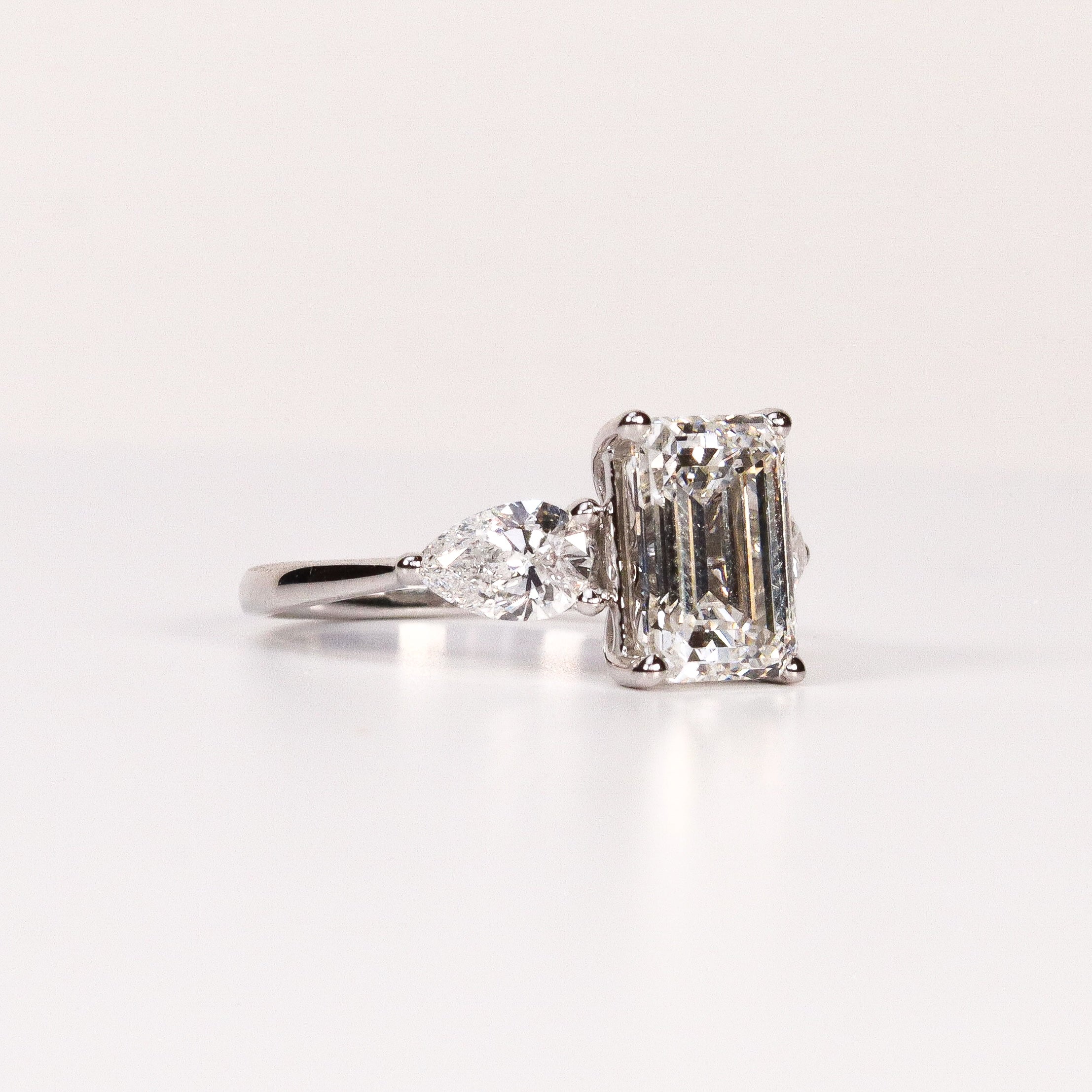 LAB-GROWN DIAMOND EMERALD-CUT & PEAR SIDE-STONE THREE-STONE ENGAGEMENT RING image 1