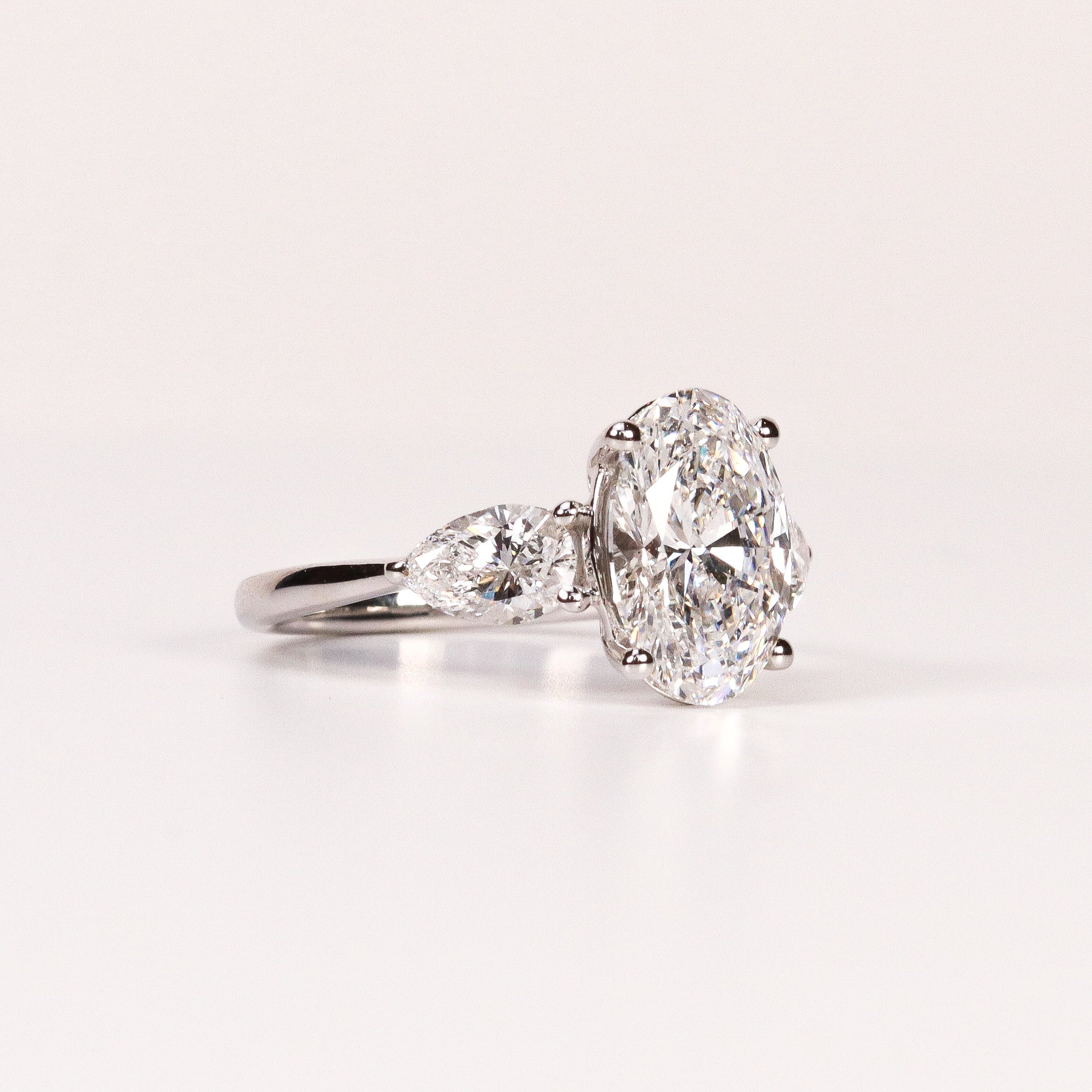 LAB-GROWN DIAMOND OVAL & PEAR SIDE-STONE THREE-STONE ENGAGEMENT RING image 1
