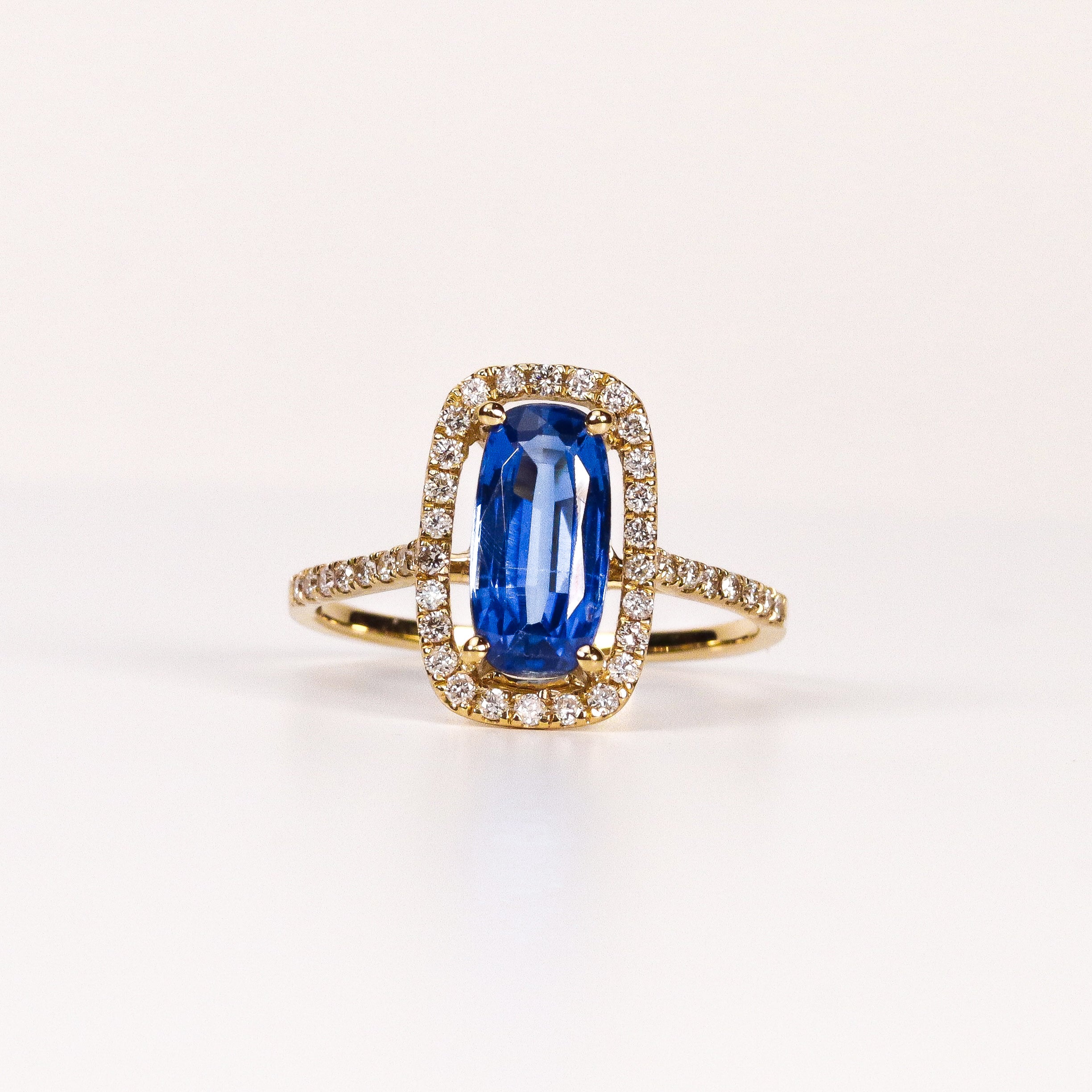 BLUE SAPPHIRE & DIAMOND ELONGATED CUSHION HALO RING image 0