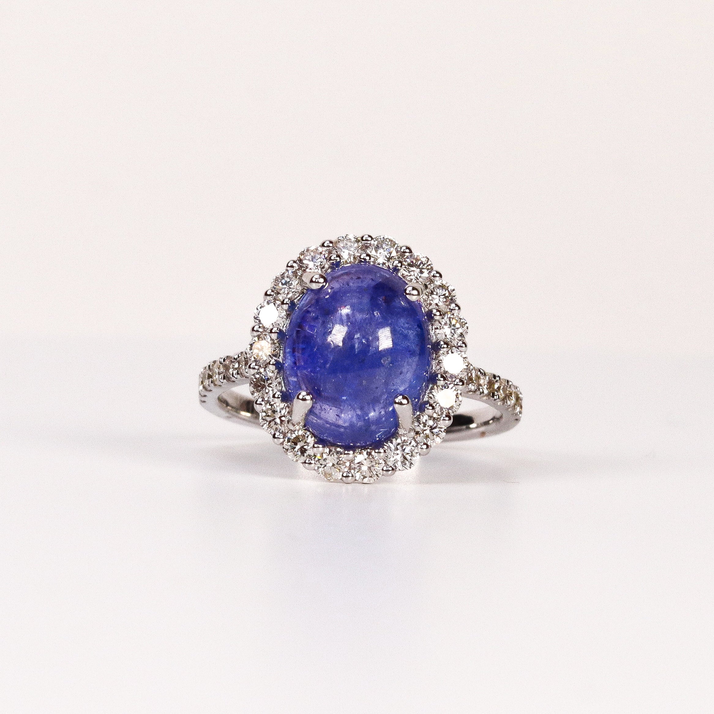 BLUE TOPAZ & DIAMOND OVAL CABOCHON HALO RING image 0