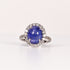 BLUE TOPAZ & DIAMOND OVAL CABOCHON HALO RING image 0