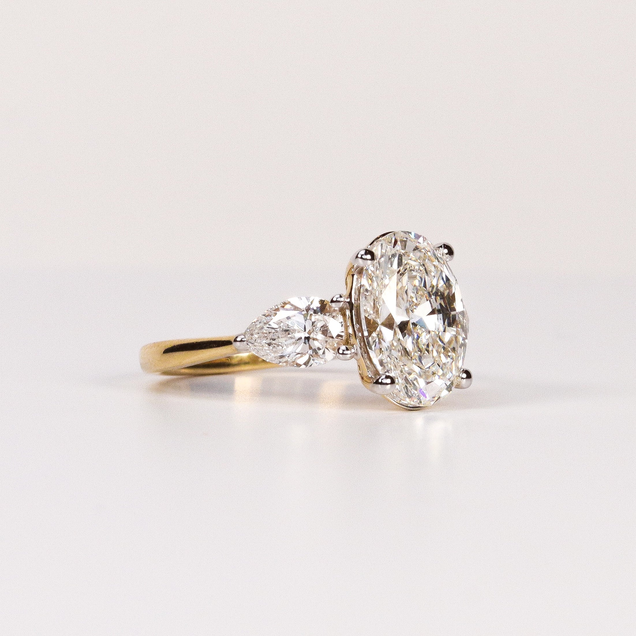LAB-GROWN DIAMOND OVAL & PEAR SIDE-STONE THREE-STONE ENGAGEMENT RING image 1
