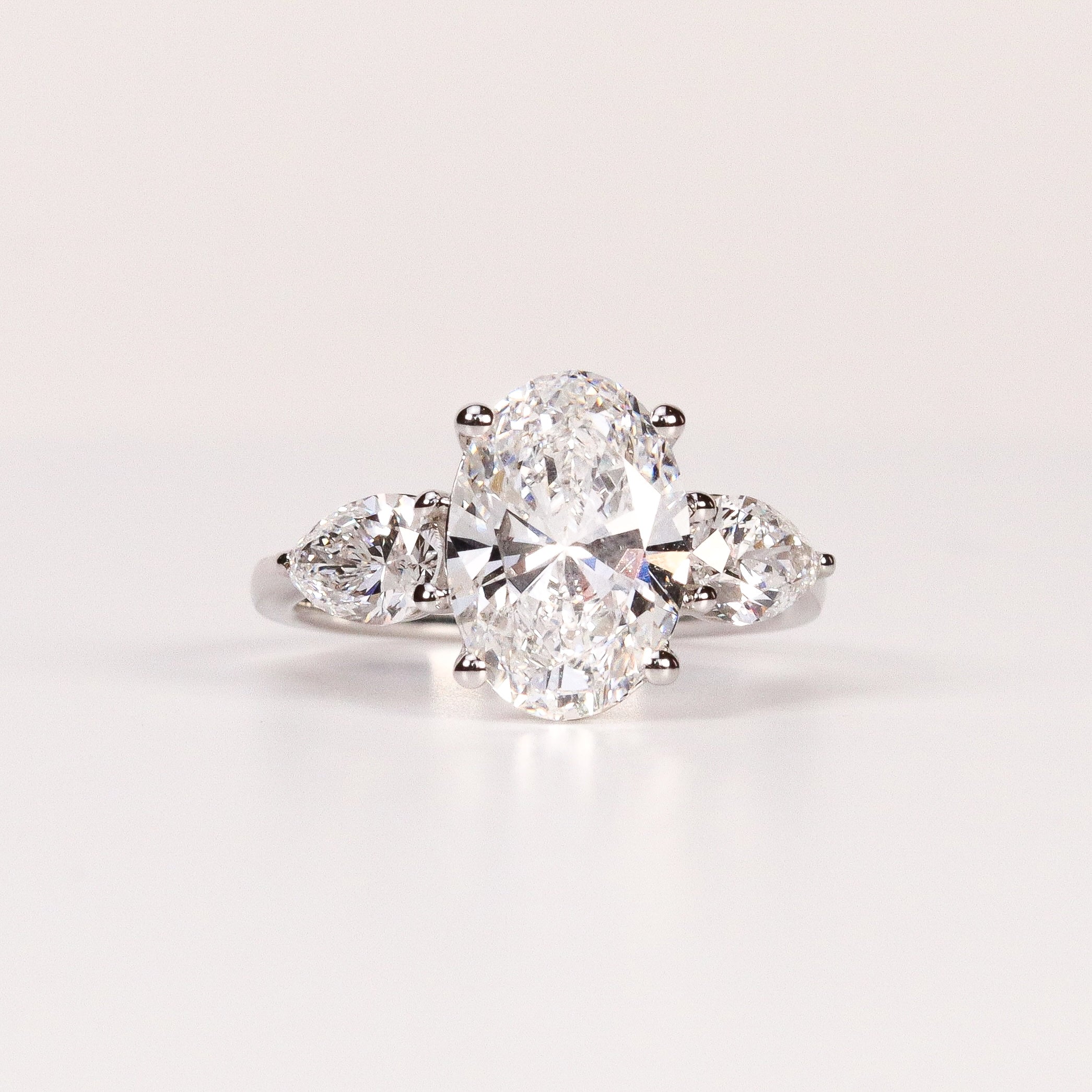 LAB-GROWN DIAMOND OVAL & PEAR SIDE-STONE THREE-STONE ENGAGEMENT RING image 0