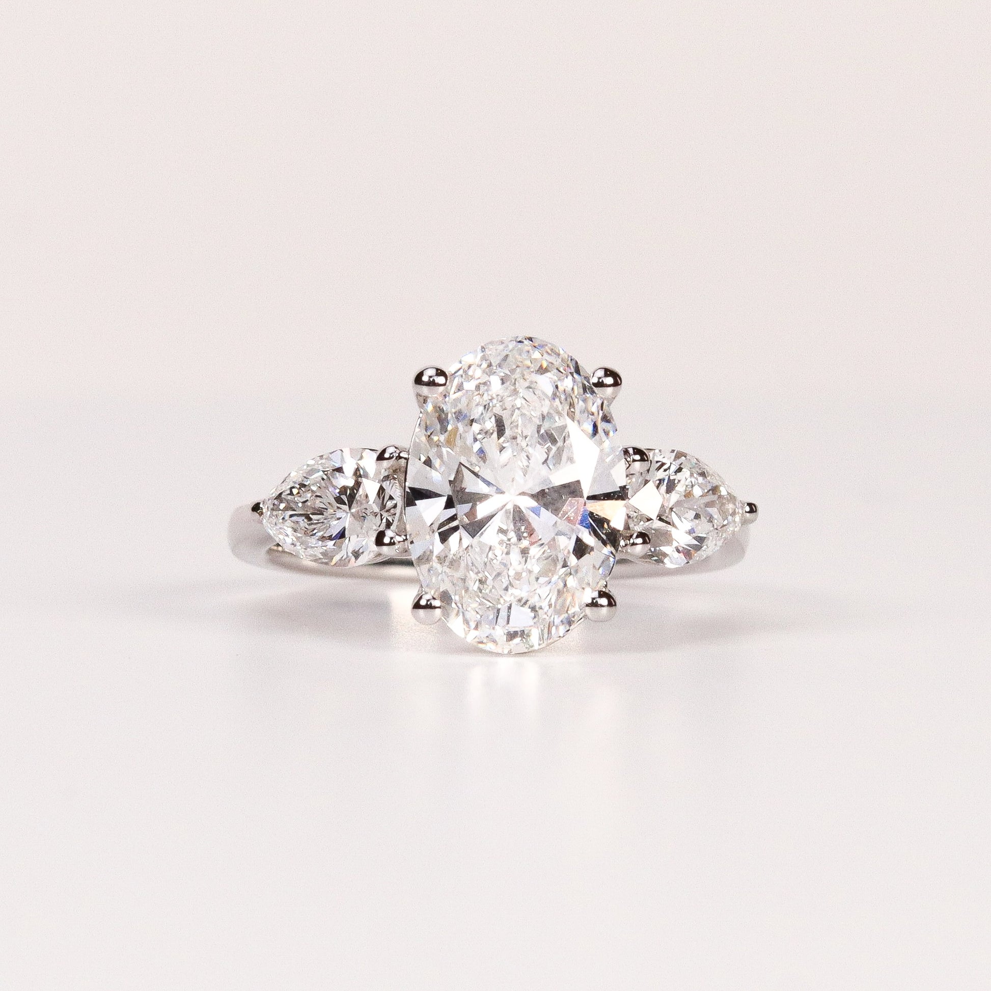 LAB-GROWN DIAMOND OVAL & PEAR SIDE-STONE THREE-STONE ENGAGEMENT RING image 0