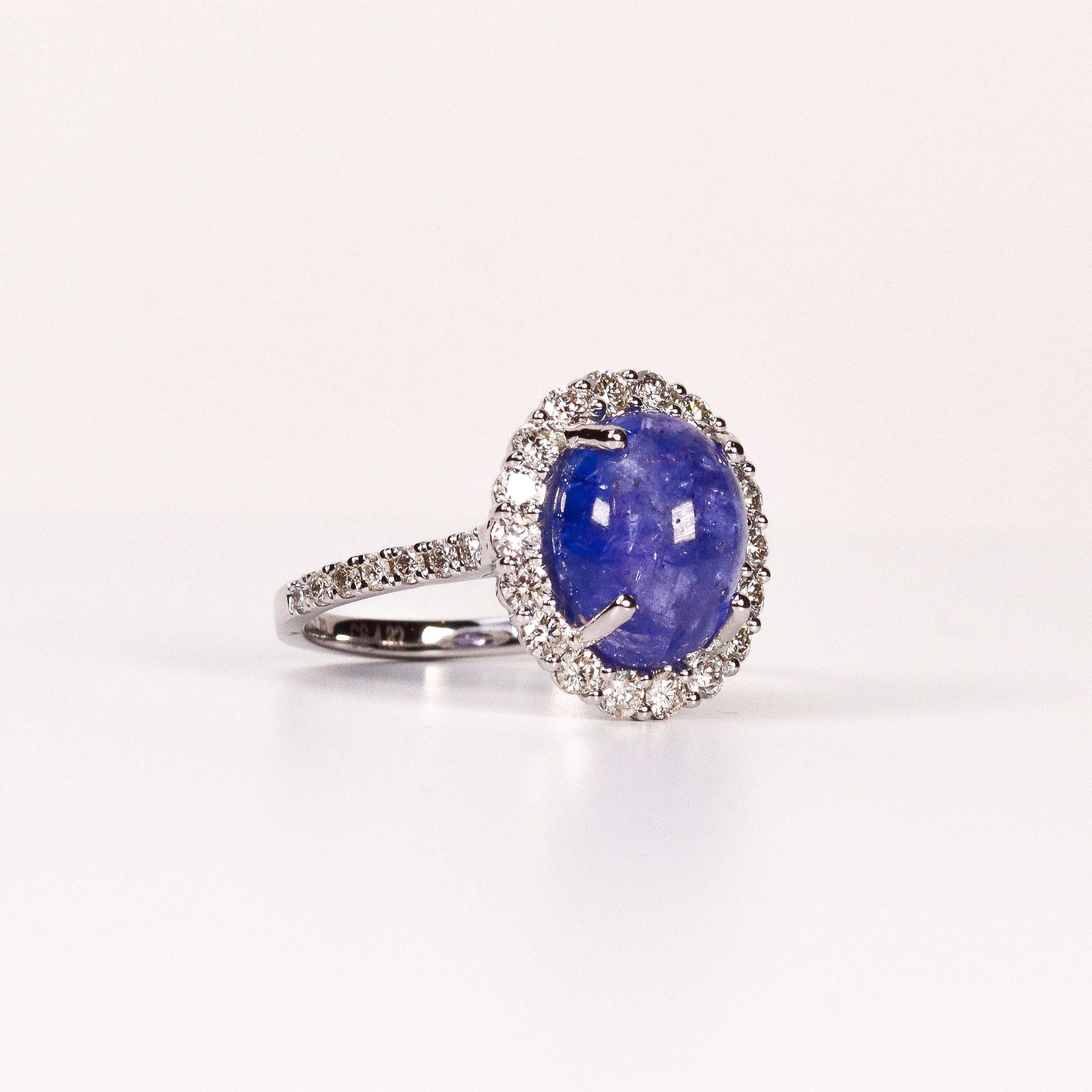 BLUE TOPAZ & DIAMOND OVAL CABOCHON HALO RING image 1