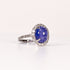 BLUE TOPAZ & DIAMOND OVAL CABOCHON HALO RING image 1