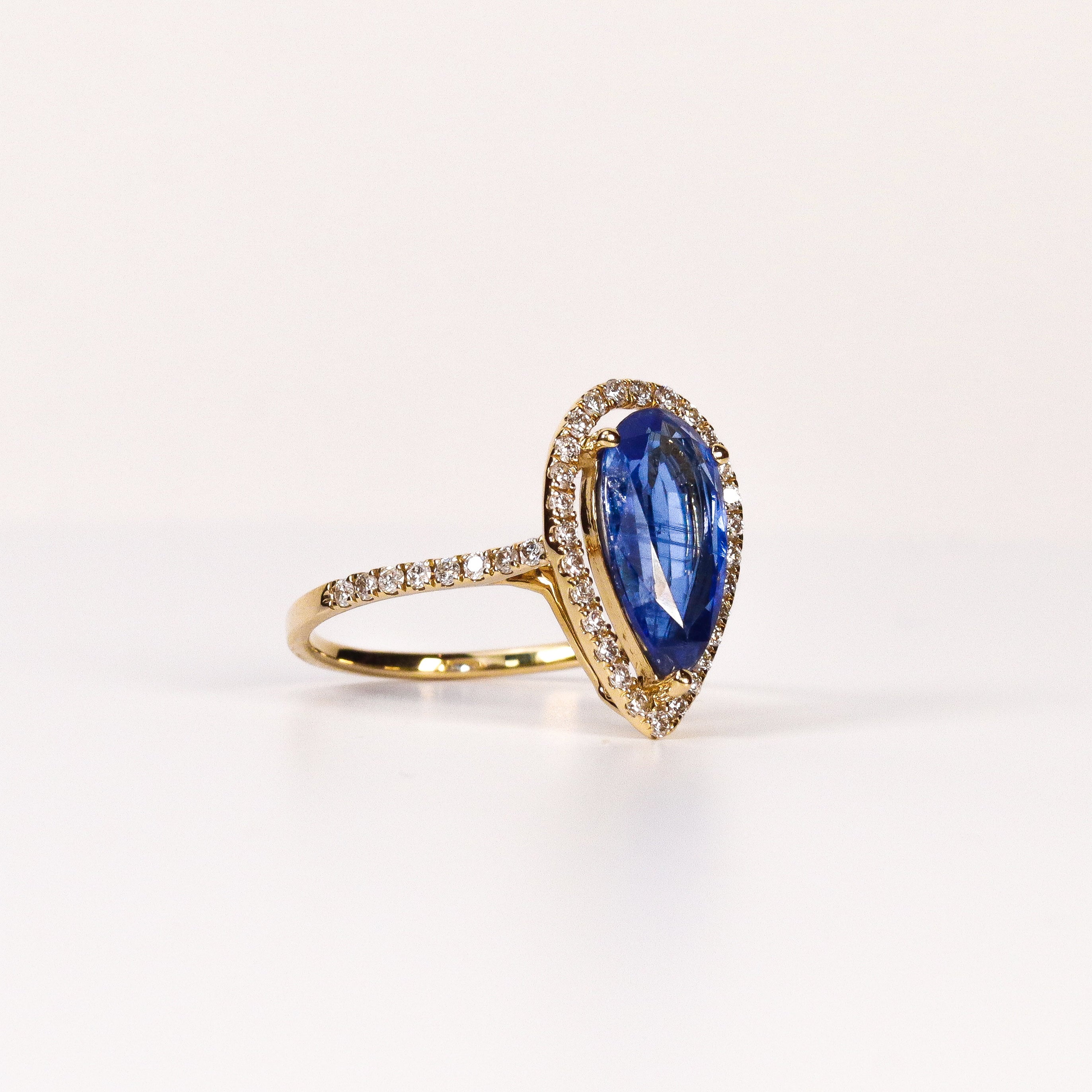 BLUE SAPPHIRE & DIAMOND PEAR-CUT HALO RING image 1