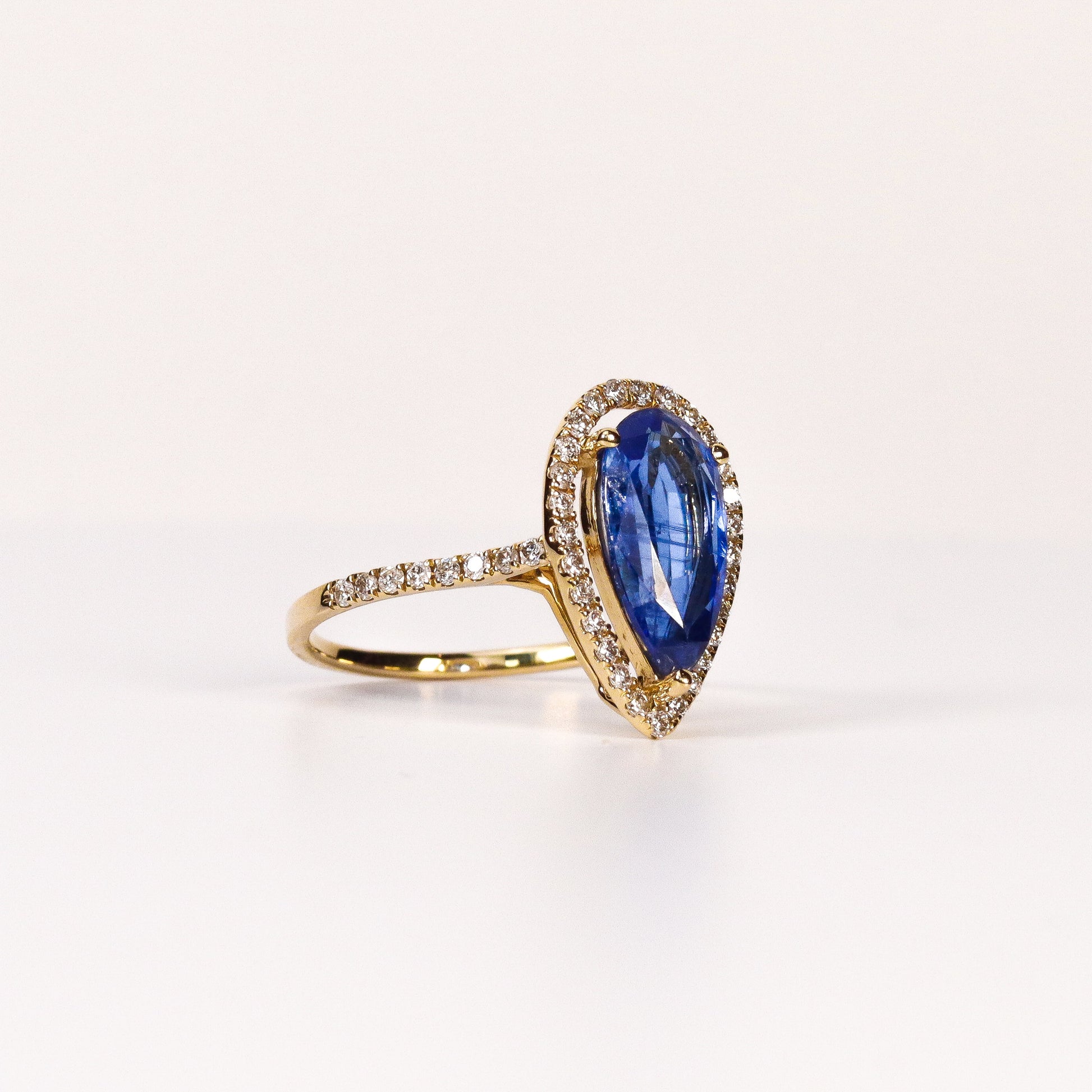 BLUE SAPPHIRE & DIAMOND PEAR-CUT HALO RING image 1