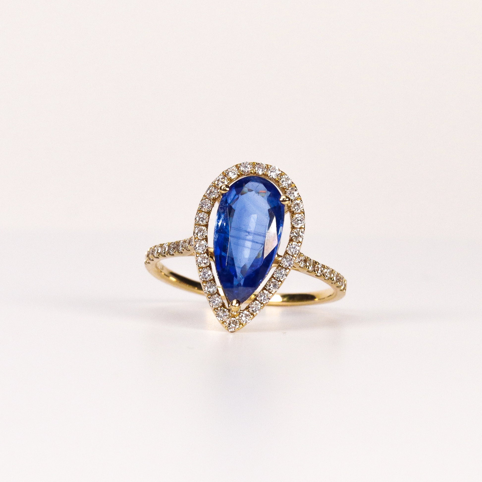 BLUE SAPPHIRE & DIAMOND PEAR-CUT HALO RING image 0